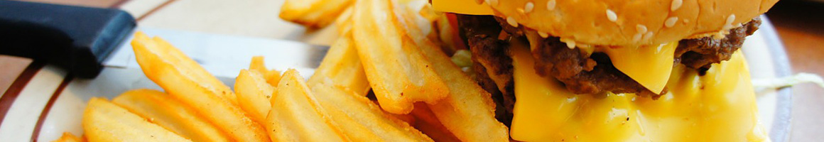 Eating Burger at Keller's Hamburgers restaurant in Dallas, TX.